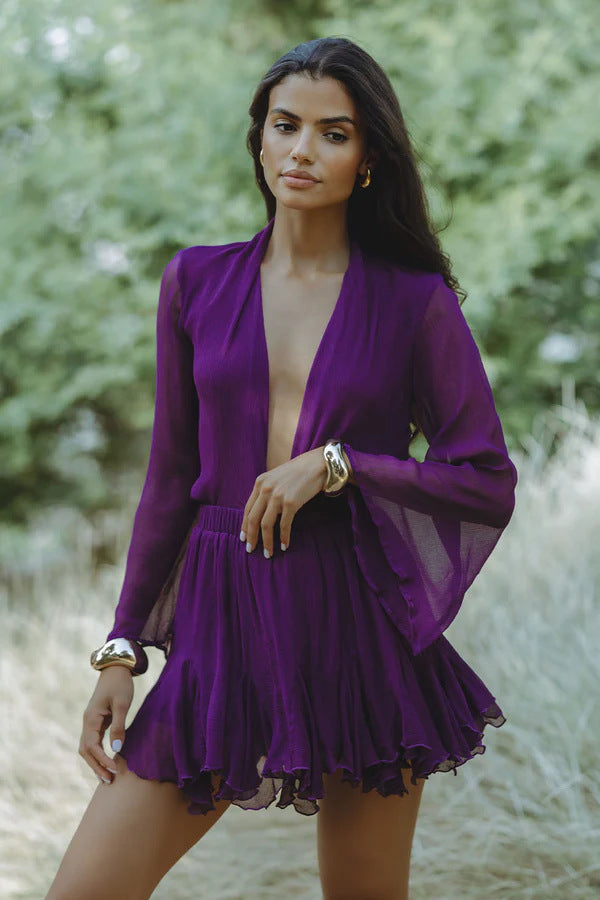 Fashionable Short Dress with a Deep V-Neck and Low Neckline DC-Beyond Borders Collective