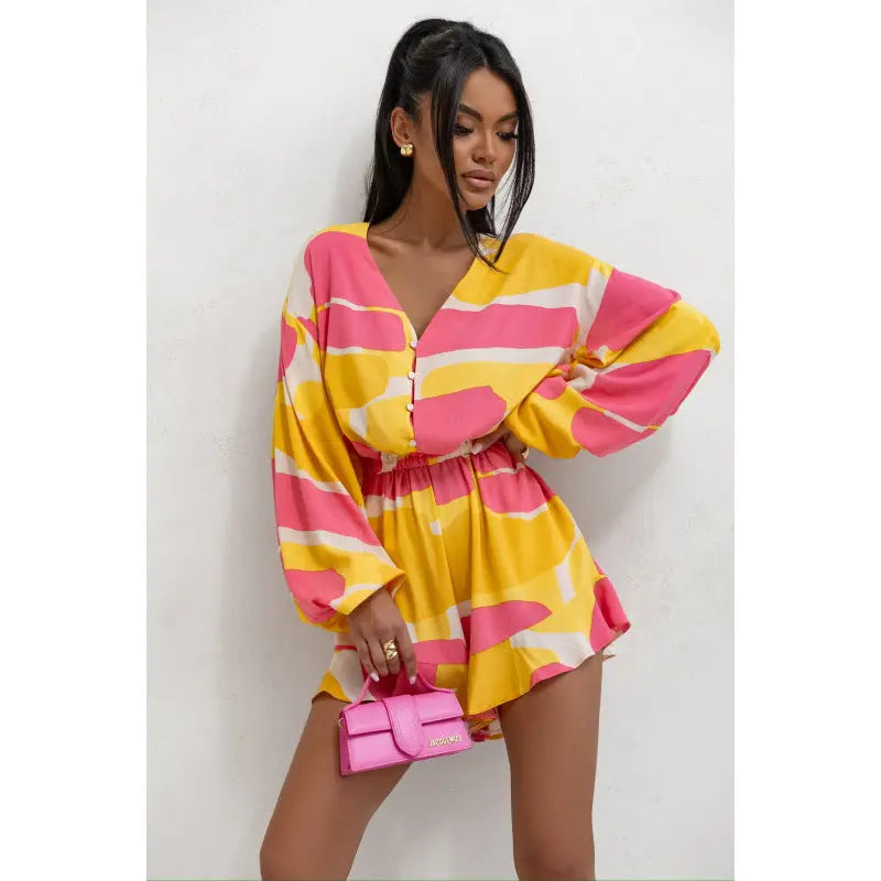 Printed V-neck Long Sleeve Jumpsuit DC-Beyond Borders Collective